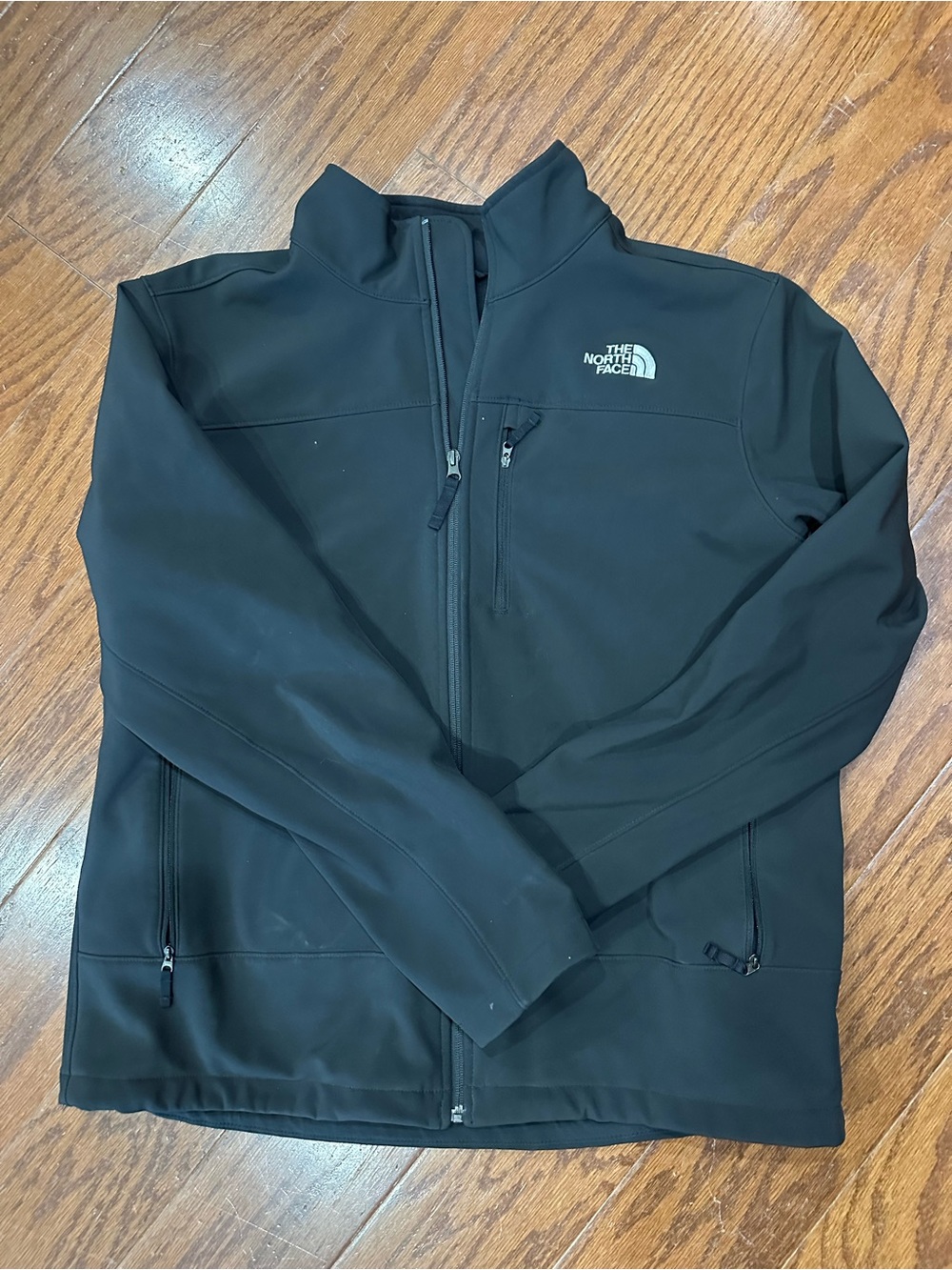 The North Face Men's Black Softshell Jacket with Zip Pockets